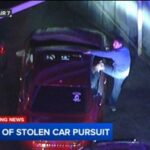 Orange County chase ends after authorities surround driver, passenger in suspected stolen car
