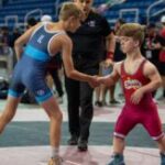 Obituary: Logan Moyer, Stewartville Wrestling Coach, Dies After Tragic Shooting Involving Student-Athlete