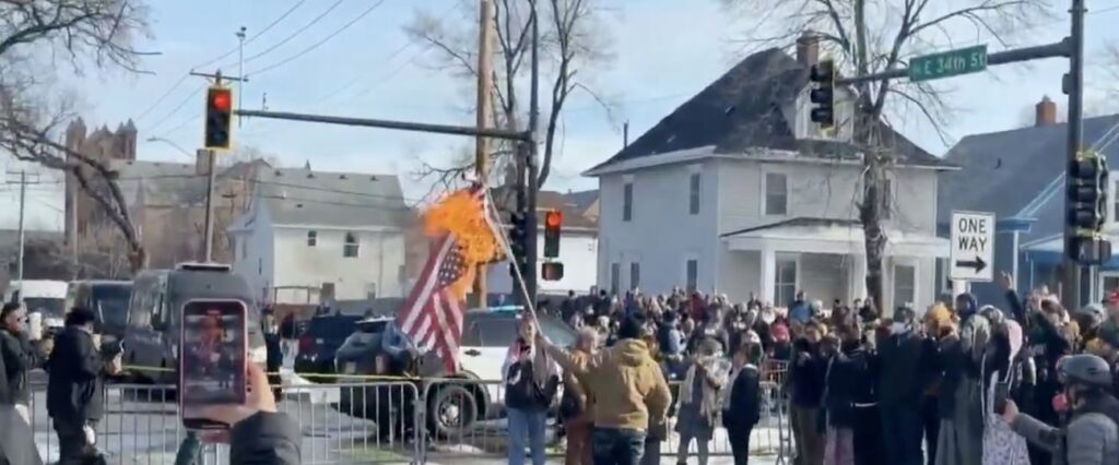 Protesters Burn American Flag Following Deadly ICE Shooting in Minneapolis